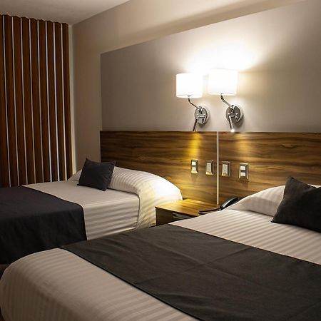 Estanza Hotel & Suites Morelia Bagian luar foto