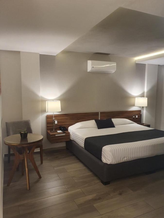 Estanza Hotel & Suites Morelia Bagian luar foto