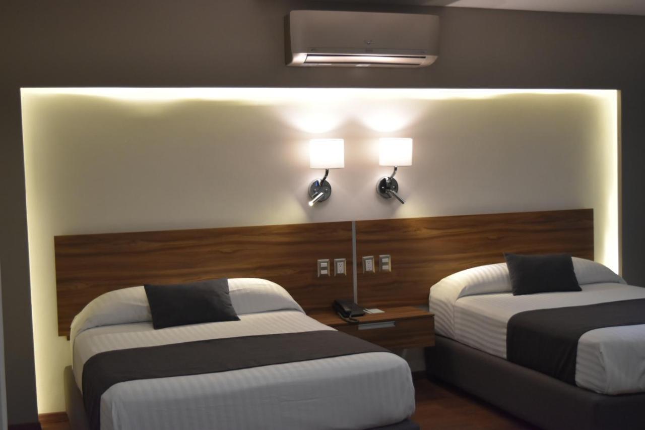Estanza Hotel & Suites Morelia Bagian luar foto