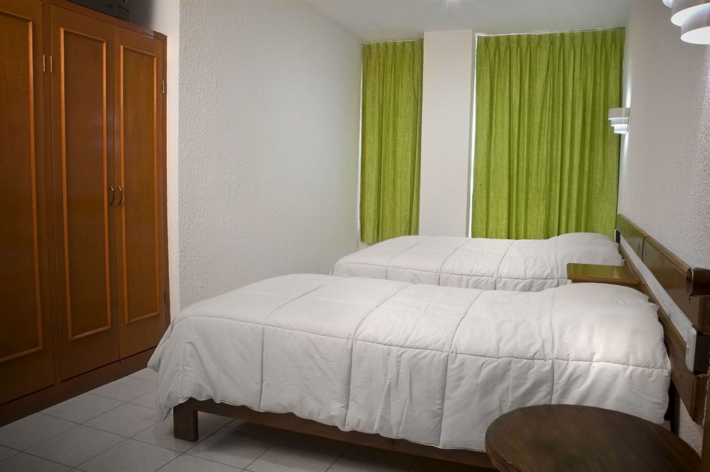 Estanza Hotel & Suites Morelia Bagian luar foto